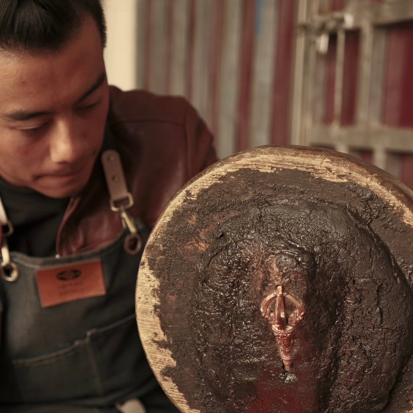 Gonpo working beside a traditional mould