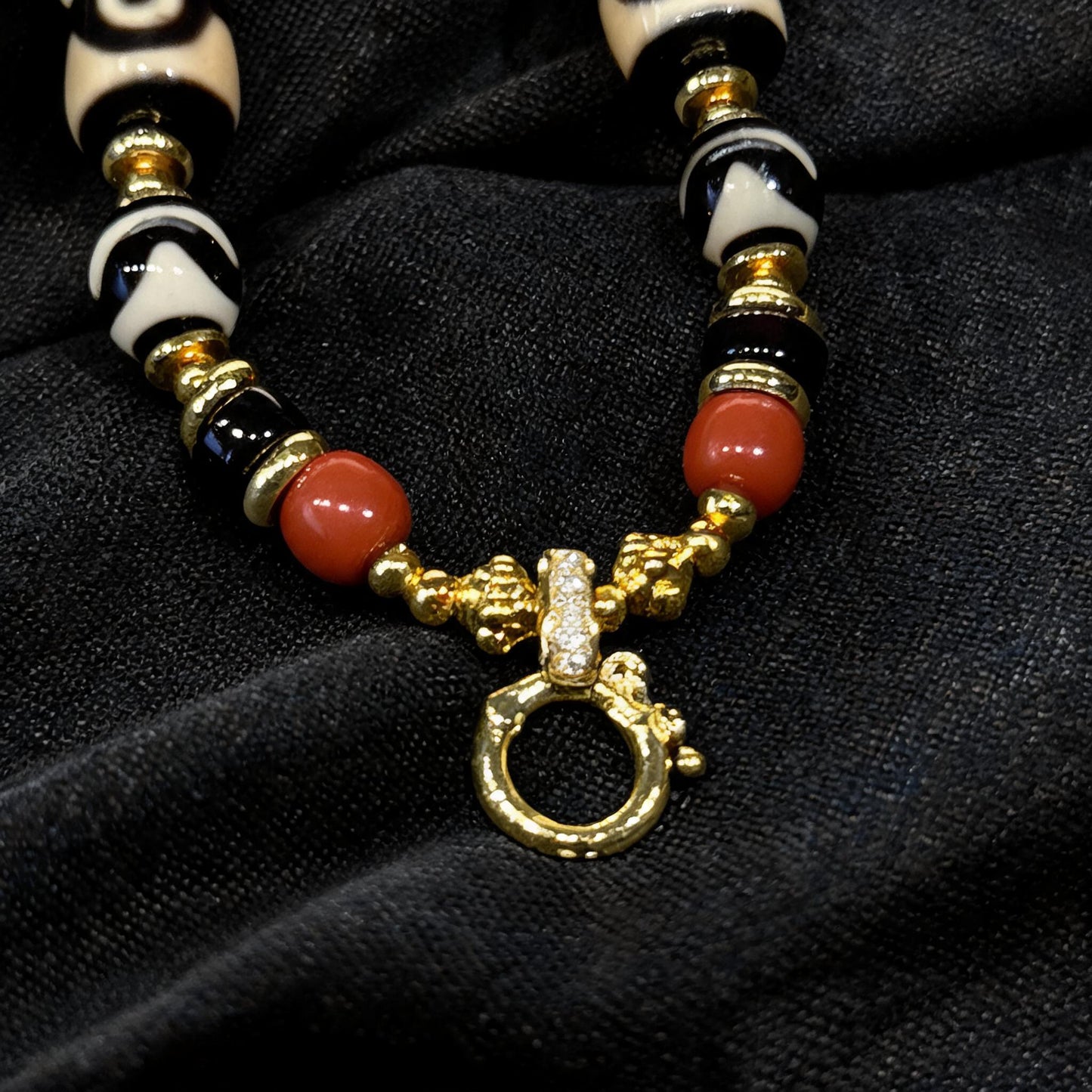 Design N dzi bead pendant detail close-up