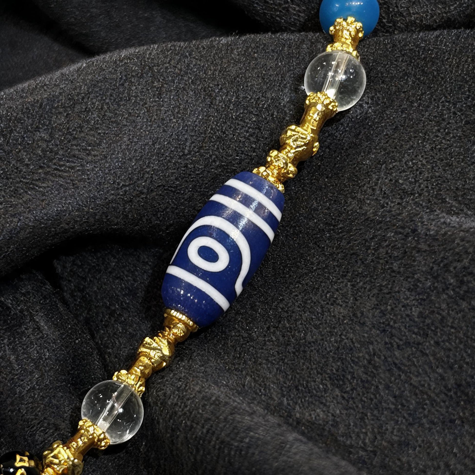 Design H dzi bead pendant detail close-up