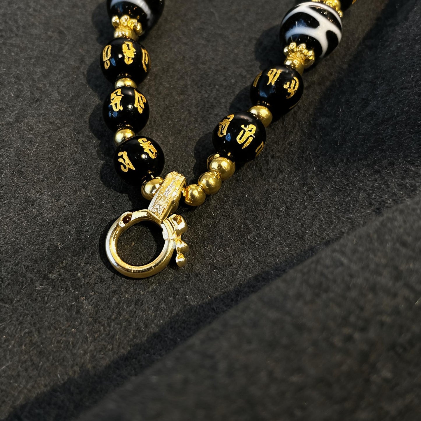 Design G dzi bead pendant detail close-up
