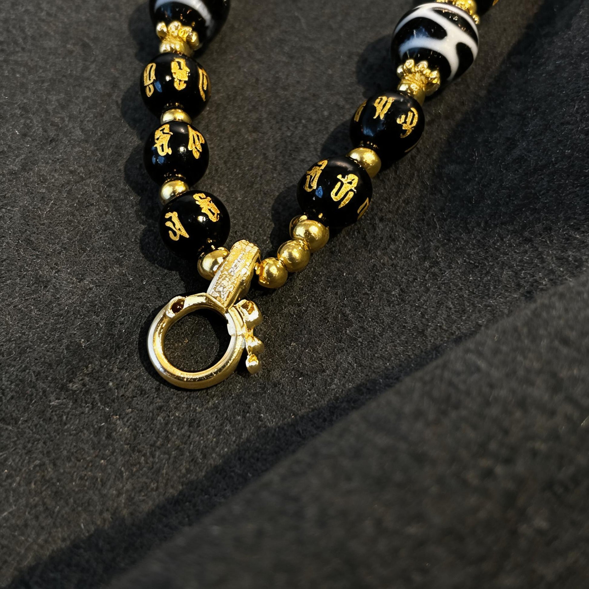 Design G dzi bead pendant detail close-up