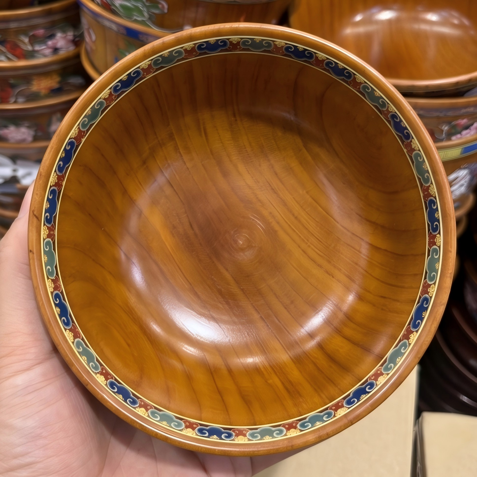 Eight auspicious motifs wood bowl close up