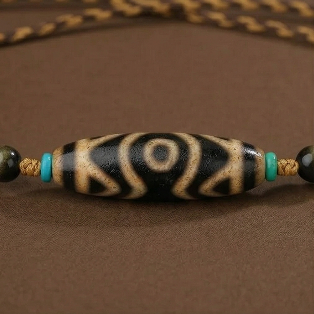 Golden obsidian and amber necklace detail