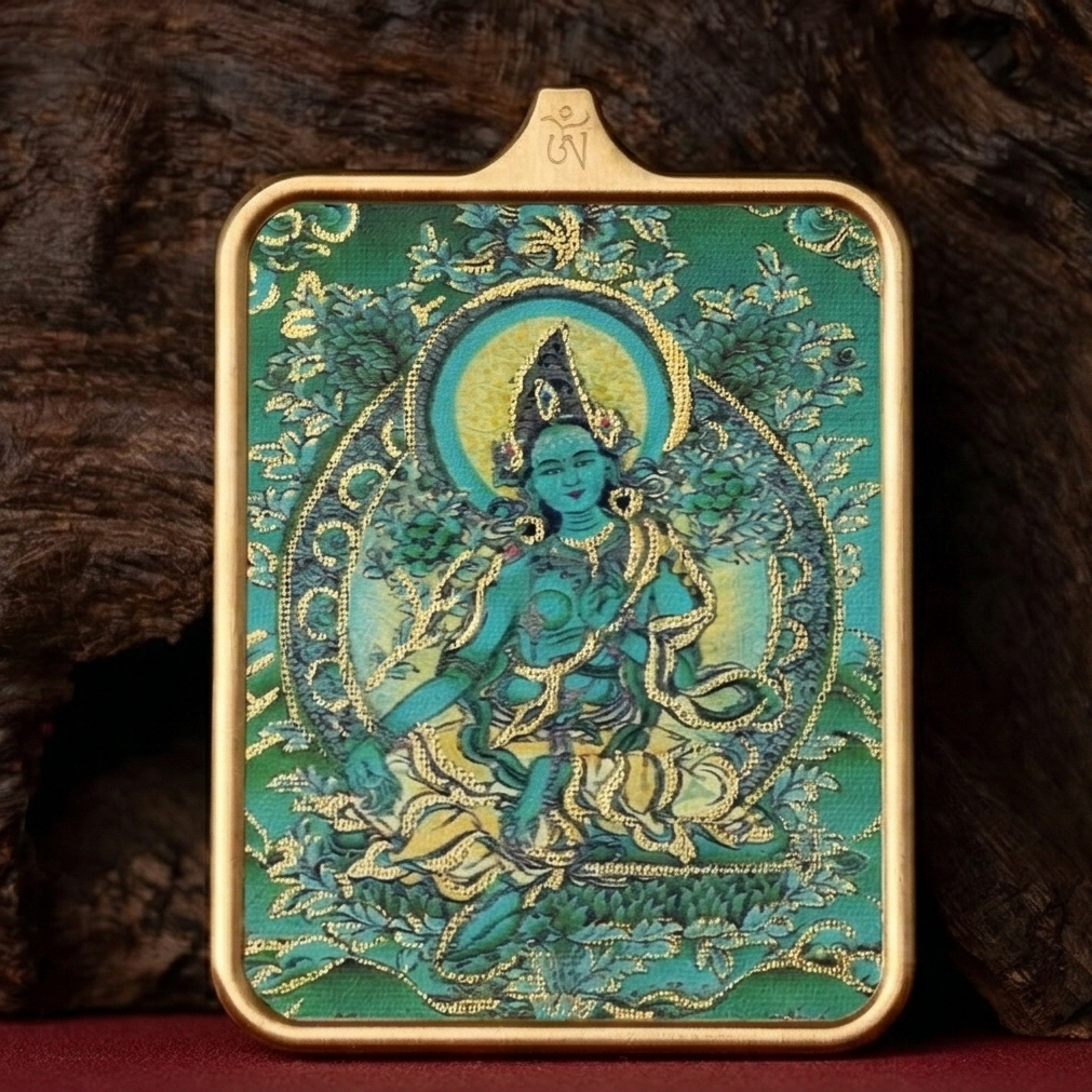Hand painted Green Tara pendant close up