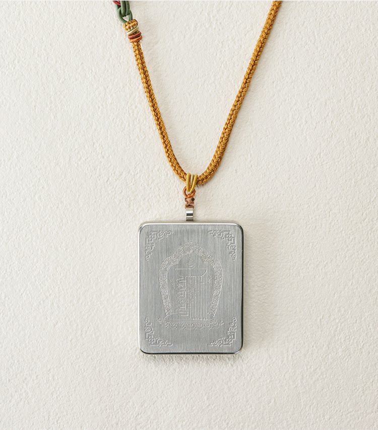 Yellow Jambhala thangka pendant necklace side view