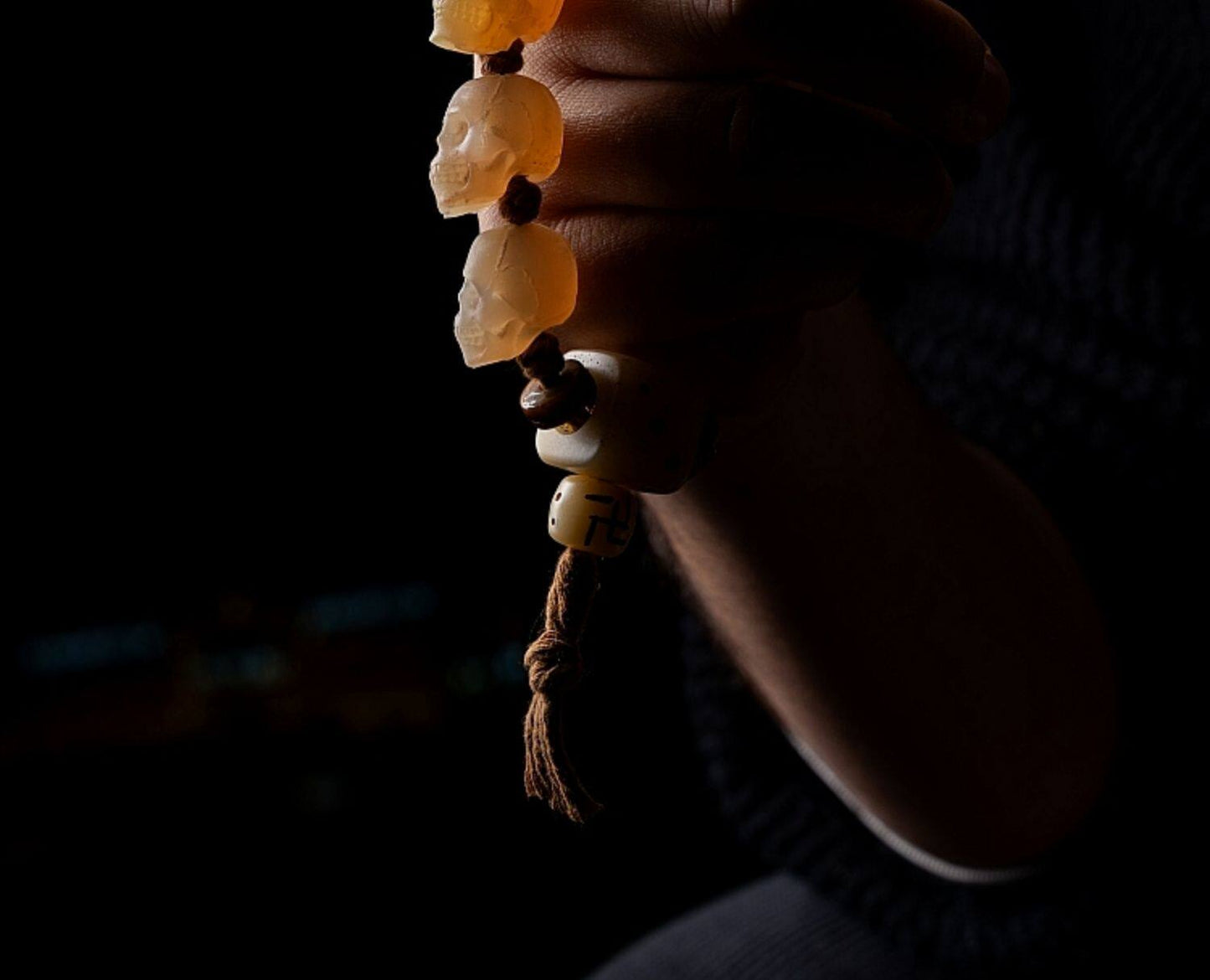 Goat horn and bead accessory texture detail