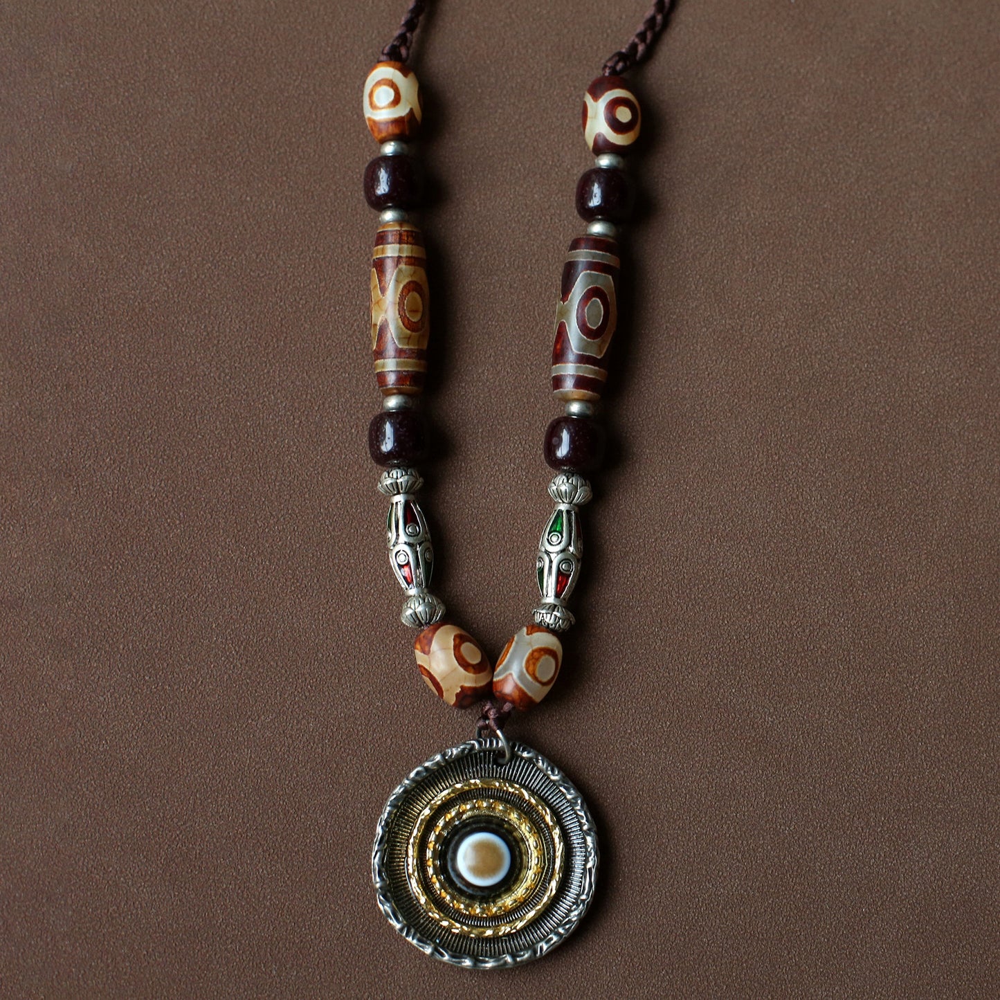 handcrafted Nepalese medicine agate Dzi bead necklace red brown front view